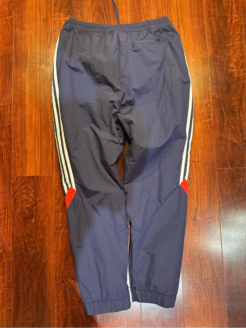 adidas Navy Track Pants with White Stripes and Red Knee Panels - Picture 2 of 7